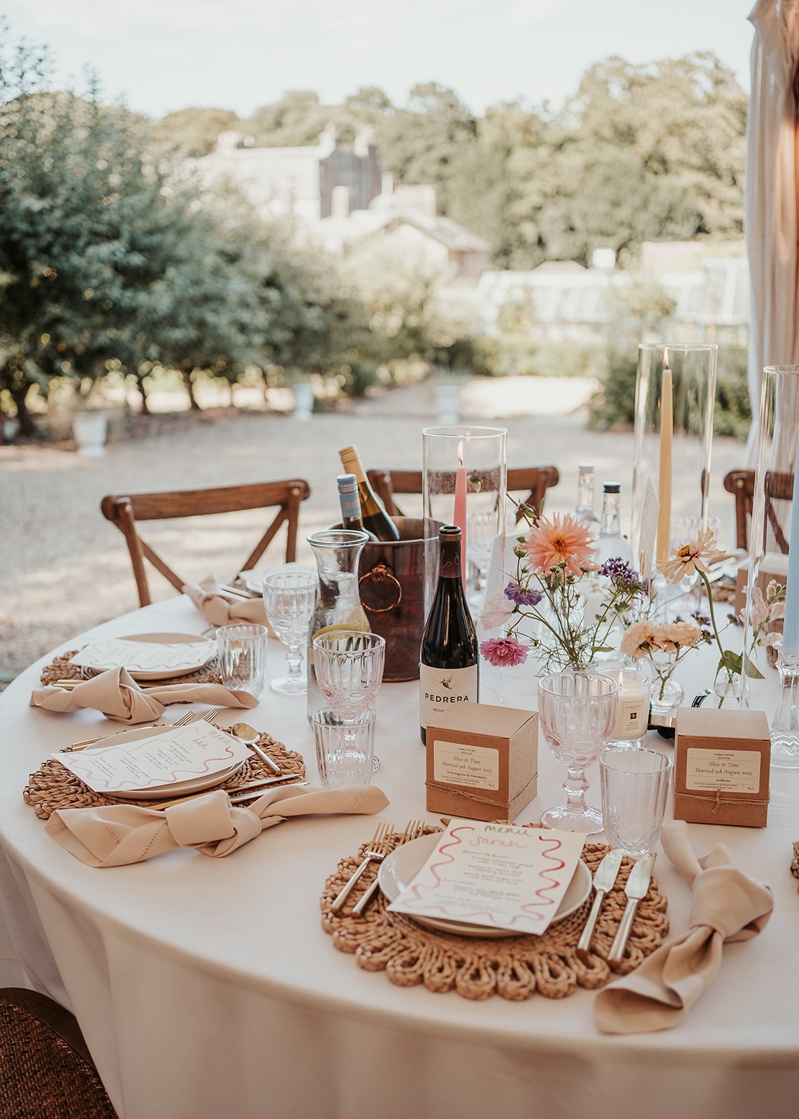 Wedding table setting with flowers and place settings at Ripple Court Estate